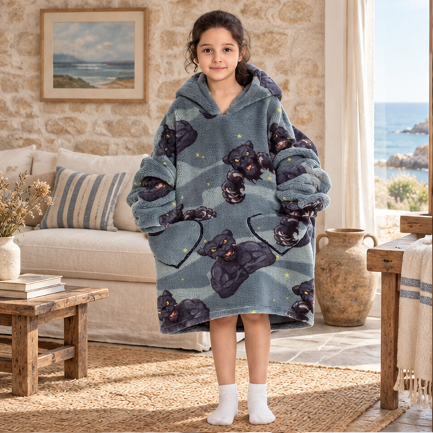 Poncho Plaid Panthère Noir, en situation sur la côte Atlantique