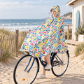 Poncho Vélo Pluie Multiples Motifs – Blanc / Adulte, visuel principal lifestyle